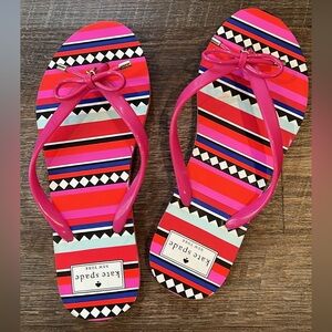 Kate Spade hot pink striped flip flops EUC size 8 but run small..